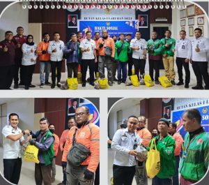 Karutan Kelas I Labuhan Deli, Eddy Junaedi dan jajaran membagikan paket bantuan sosial kepada pekerja ojek online, petugas kebersihan, serta masyarakat di sekitar lingkungan Rutan.
