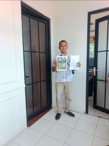 Foto : Ketua Forwaka Asahan Doly Dien Simbolon membuat laporan resmi ke Polres Asahan terkait pengrusakan Plang Forwaka, Senin (11/5). 